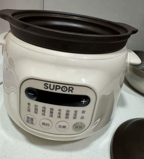 苏泊尔电炖锅全自动家用大容量紫陶内胆可预约...