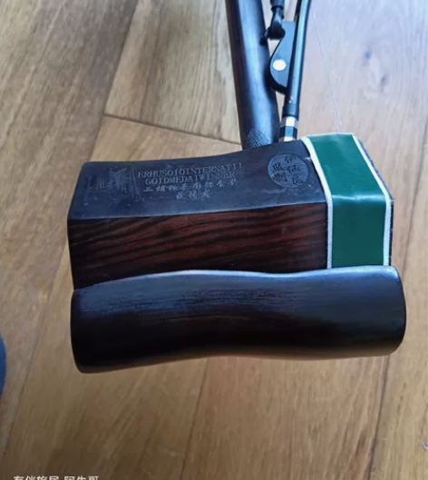 越胡！黑檀木，乌屑皮换过的有点软，声音洪亮...