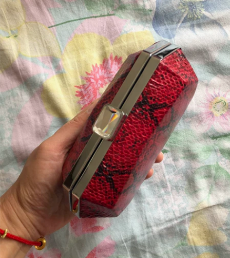 女士手拿/斜挎硬壳包,买来没有使用过,链子...