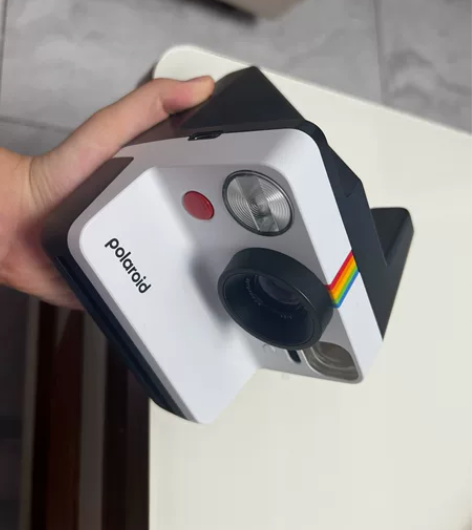 宝利来相机拍了不到一盒胶片[微笑] 目前不...