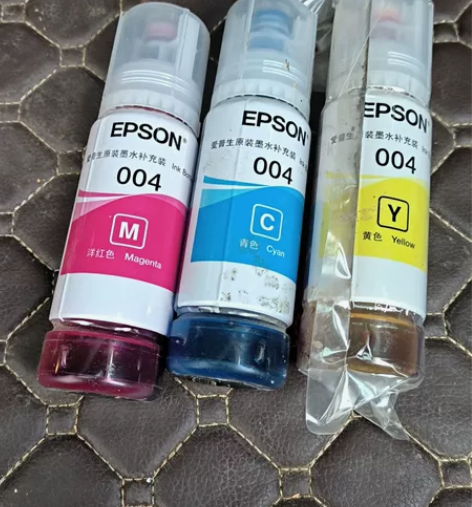 打印机坏了，剩下三瓶墨水，黄色为拆封，粉色...