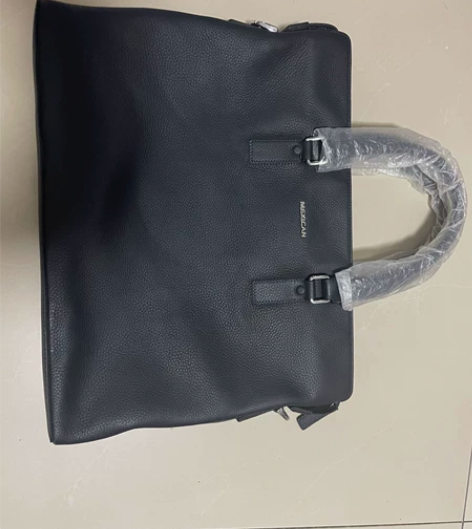 全新稻草人商务皮包，软牛皮材质，可手提单肩...