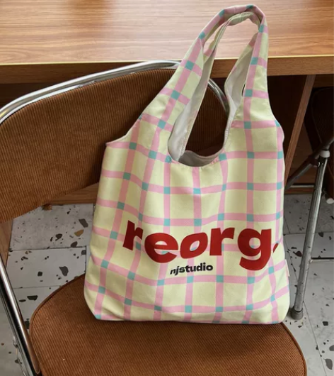 新款ins韩风小众设计帆布包背心包通勤单肩...