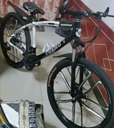 低价处理自行车山地车男女成年变速减震男女通...