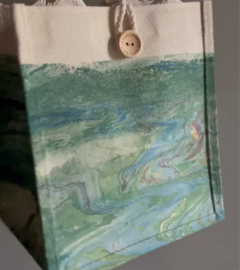 大漆漂染手提包包 在古城逛街的时候弄的，帆...