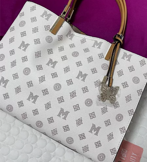 稻草人女士手提包，全新一次没背过 线下购入...