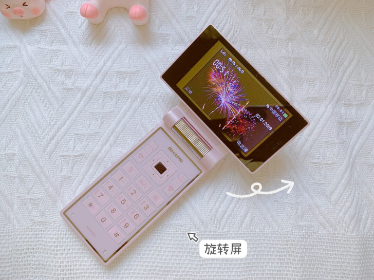 夏普粉色旋盖手机