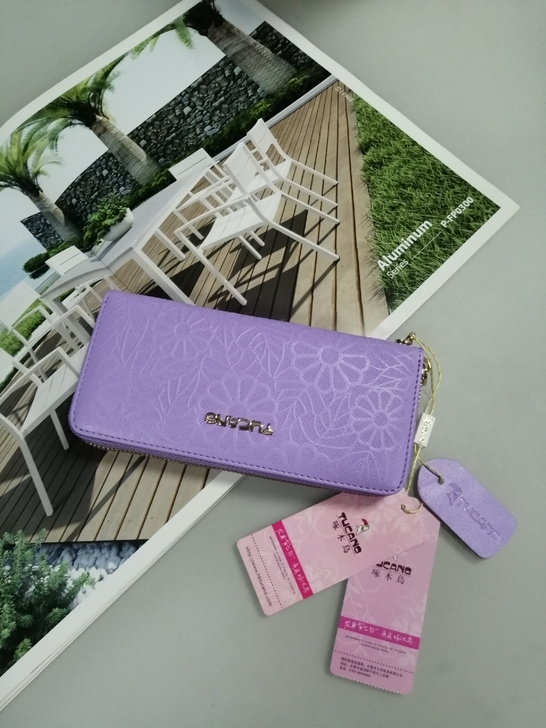 全新正品啄木鸟真皮女士手拿包，钱包，高品质...