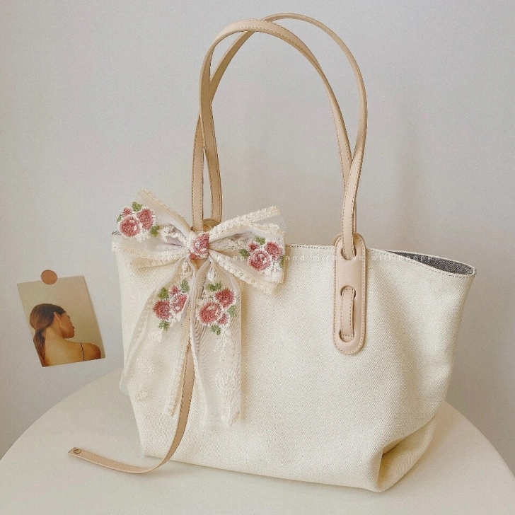 2021新款大容量简约百搭通勤帆布包女包i...