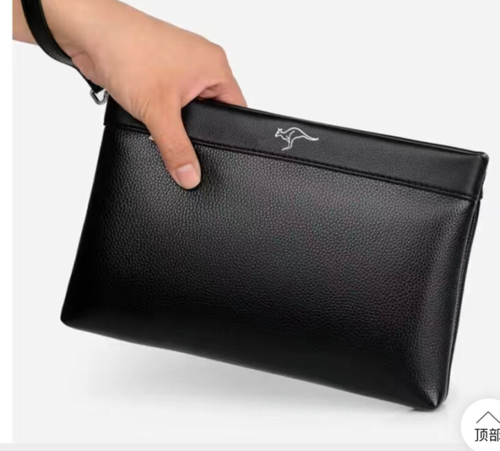 出一款男士手提包是头层牛皮的，质量好柔软舒...