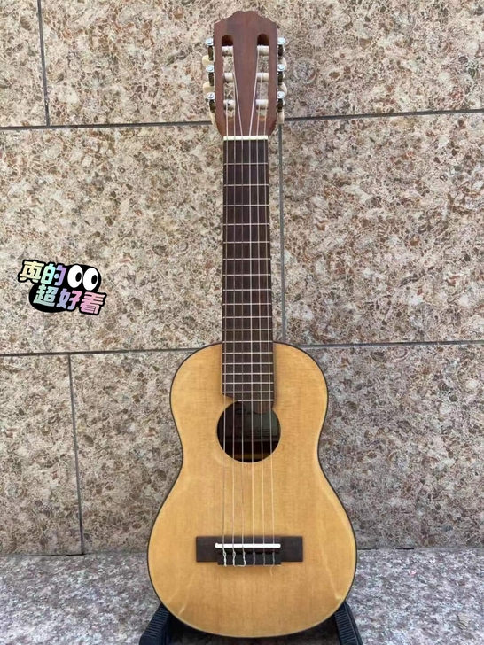 云杉桃花心，合板民谣吉他，28寸，非常小巧...