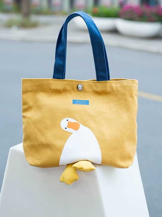 可爱小鸭子帆布包包女夏手拎书包单肩斜挎包手...