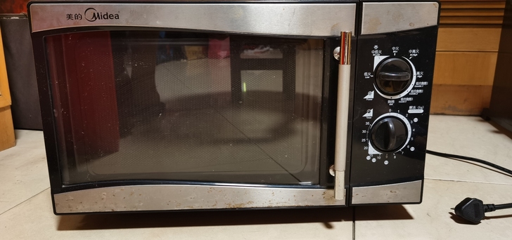 美的微波炉，用过两次洗干净消毒后一直在仓库...