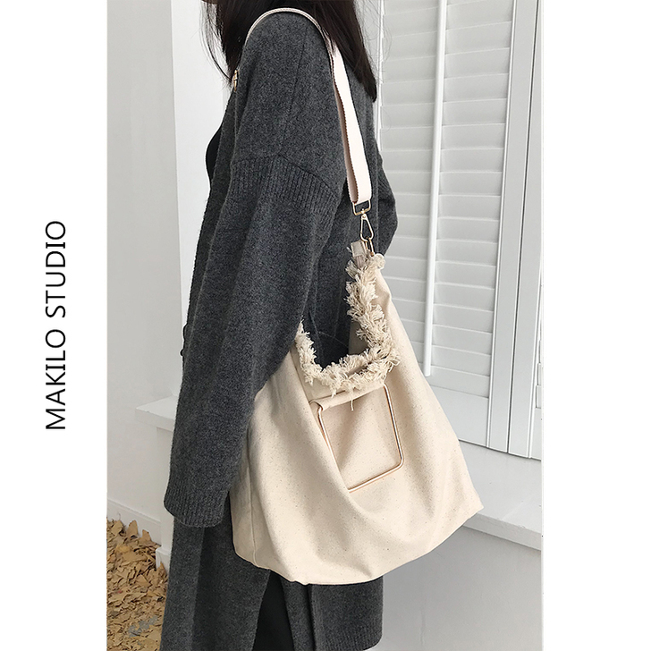 【MAKILO】小众时尚金属扣休闲大容量米...