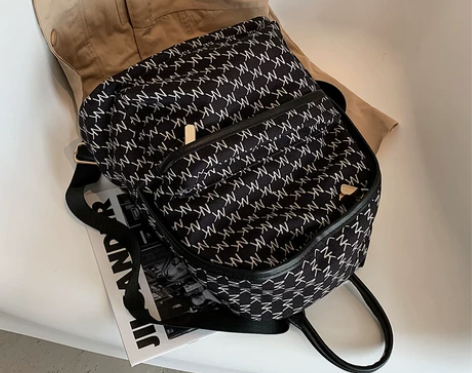 大学生上课包包女2020新款潮时尚简约双肩...