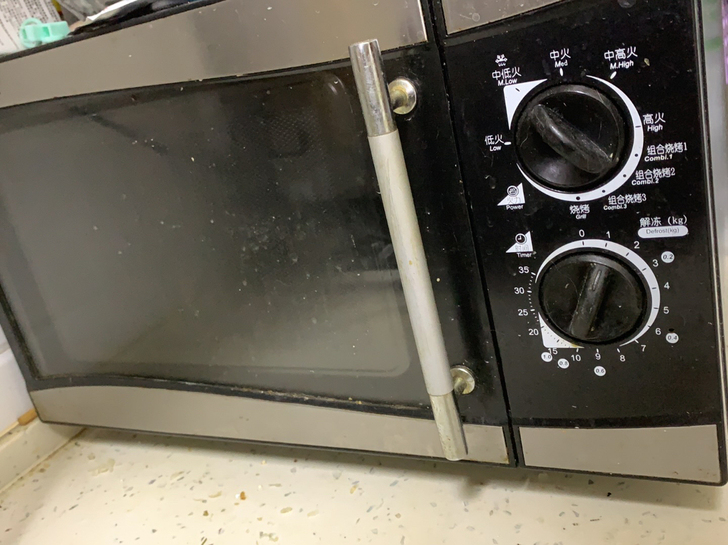 长58，宽29，侧面宽33.5，美的微波炉...