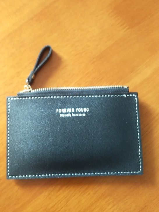 钱包买回来没用过！