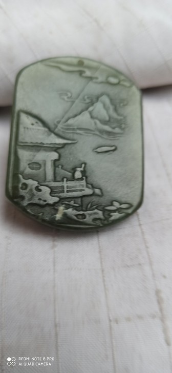 和田玉雕刻的山水画入手渠道：在古玩市场淘的，