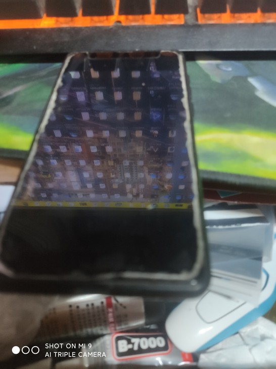 小米mix2换过一次屏，摄像头又积灰