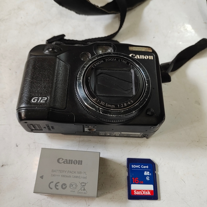 佳能  G12数码相机，成色一般，有使用痕...