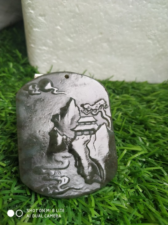 和田玉雕刻的山水画