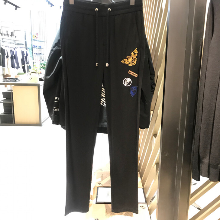 品牌:GF FERRE 黑色刺绣休闲裤