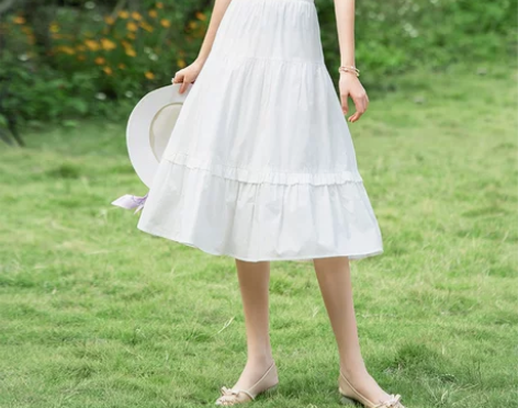 松紧腰木耳边a字半身裙蛋糕裙中长款2022...