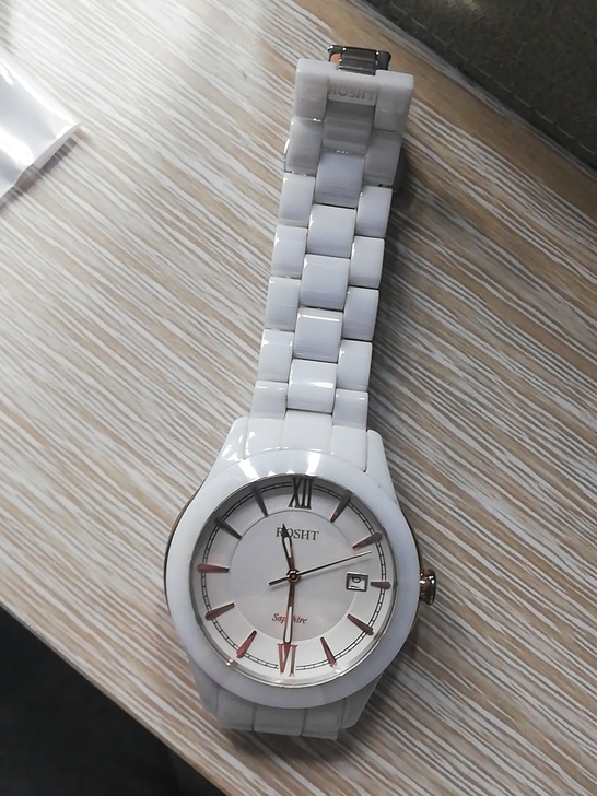 陶瓷白色女款腕表前男友送的停了自己换个电视...