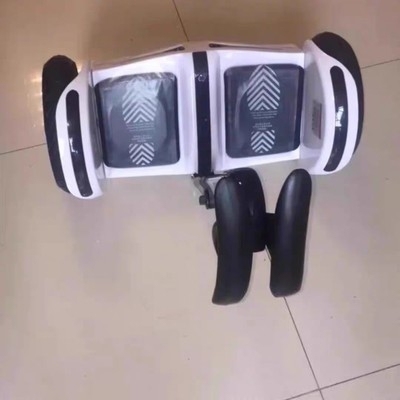 鑫龙吟电动自平衡车儿童成年带扶杆腿控越野体...