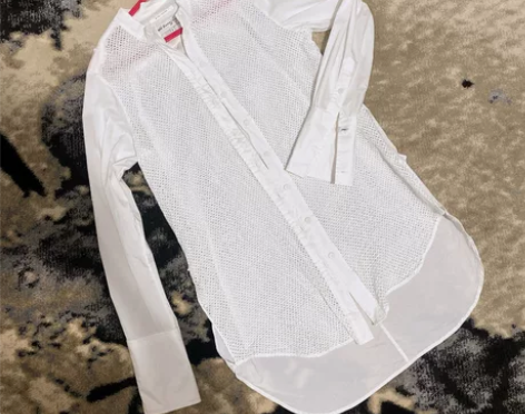 长款镂空纯棉白衬衣 品牌型号 康金庸 懂得...