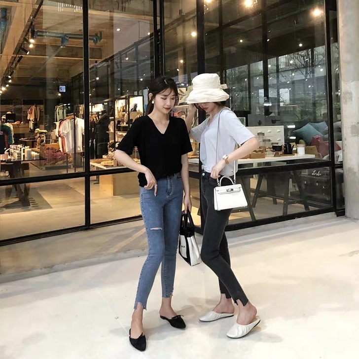 小怡潮港风紧身破洞牛仔裤女网红小脚裤显瘦铅...