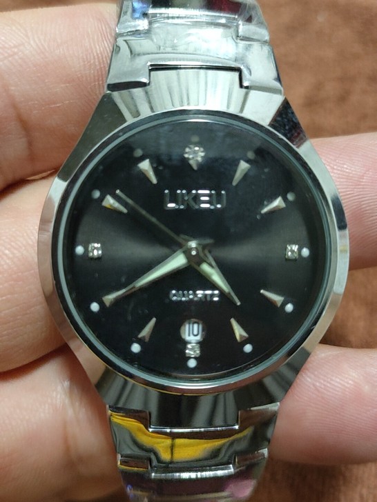 全新LIKEU石英机芯钨钢表带表盘，走时正...