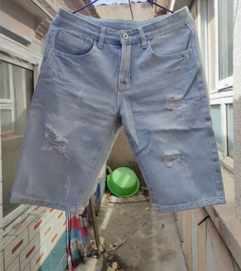 浅色水洗破洞牛仔短裤男夏季宽松直筒男五分裤...