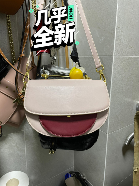 真皮斜挎包春款韩版时尚双肩带单肩斜跨拼色马...