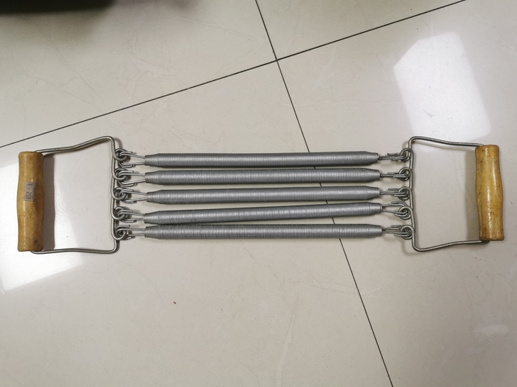 弹簧拉力器扩胸器男健身器材家用拉簧臂力器锻...