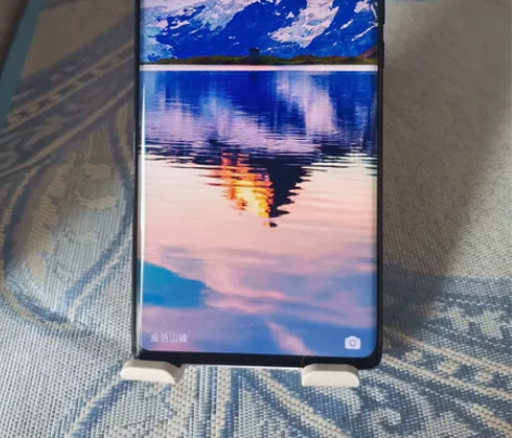 出售一台荣耀60SE 5G曲面屏手机。运行...
