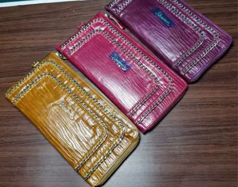 商场撤柜 袋鼠女士真皮手拿包 头层牛皮 头...