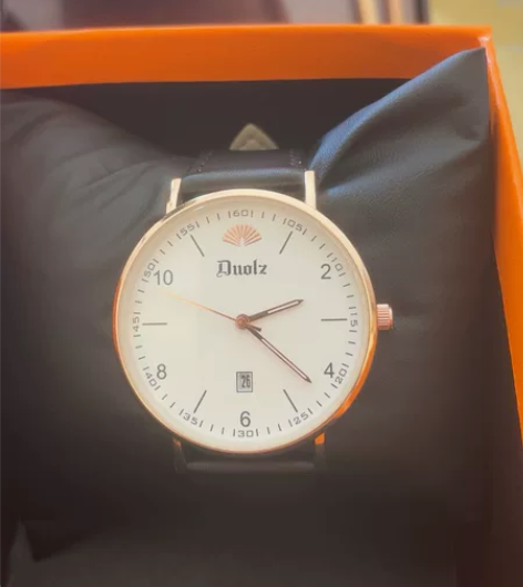 多伦兹正品超薄防水皮带石英表男款 感兴趣的...