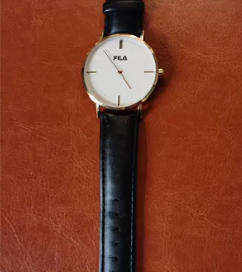 斐乐手表男款，京东自营购入，买到是情侣表对...