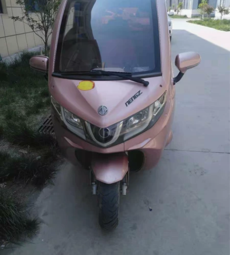 因城市限行低价出售能众封闭式电动车，去年1...
