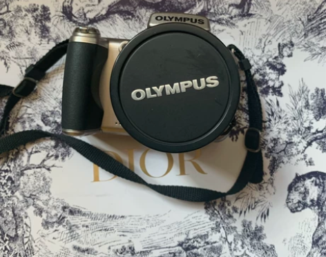 奥林克斯相机 送原装充电器和相机包 爽快的...