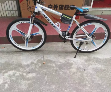 【亏本特价】山地车学生越野车减震赛车通勤自...