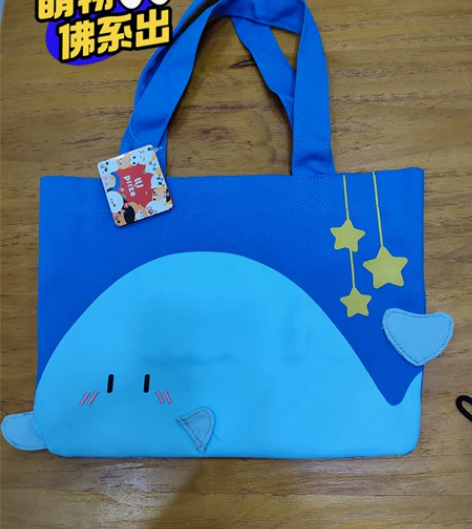 全新LLJ夹机占牙仙小鲸鱼帆布包 全新有吊...