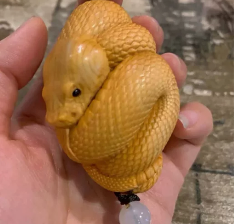 手工雕刻崖柏手把件木雕生肖手把玩件木制雕刻...