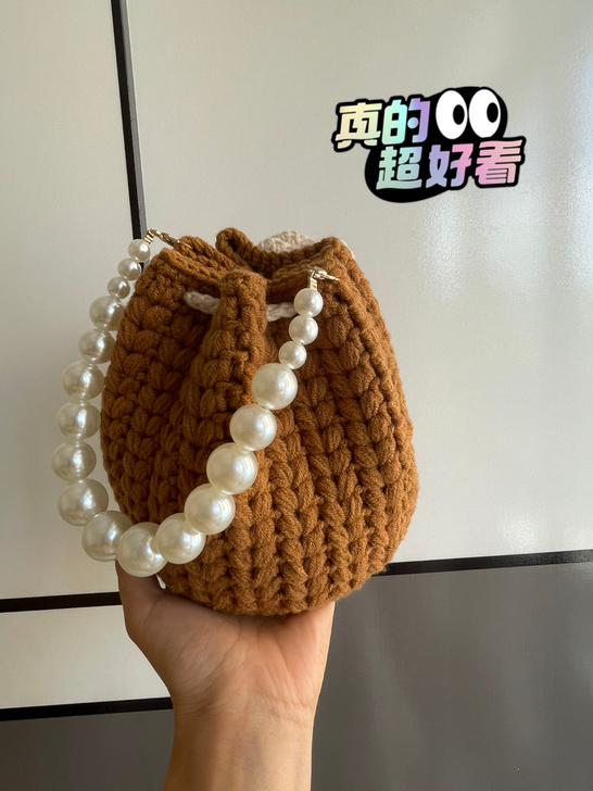 手工编织毛线束口包包