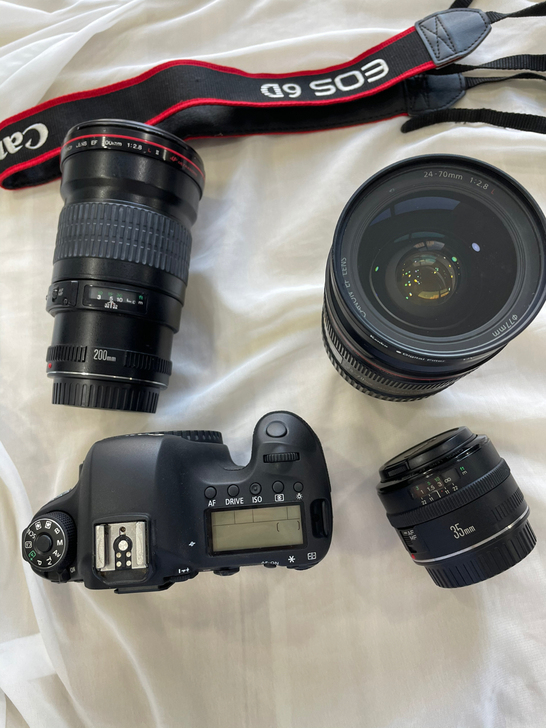 出佳能6d 全画幅单反相机搭配24-70一...