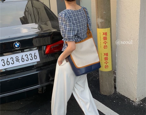复古撞色帆布水桶包2021新款小众设计斜挎...