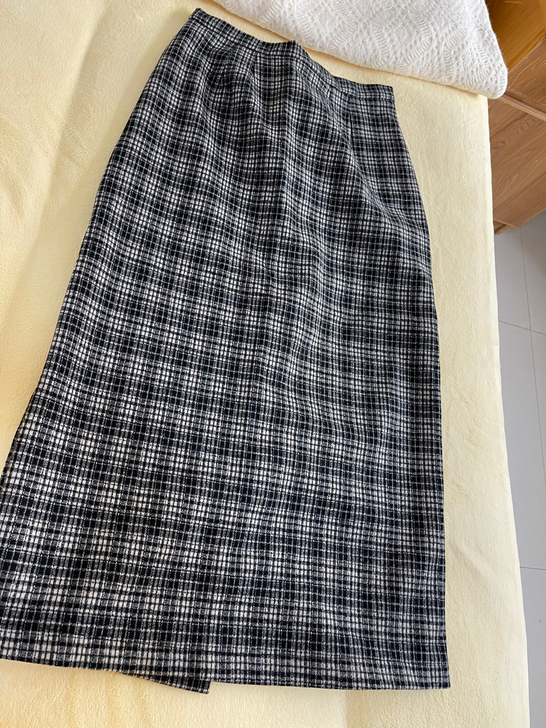 格子半身裙 洗过一次，穿过一次，又洗了一次...