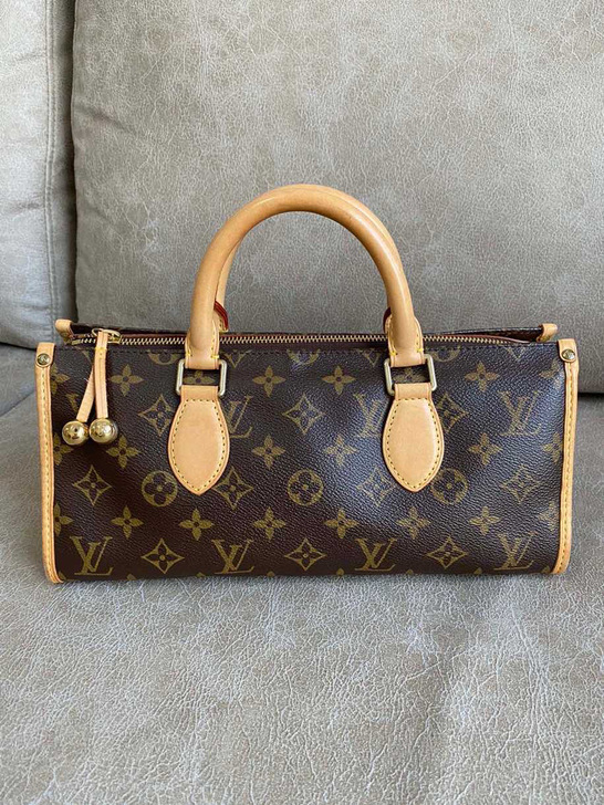 LV路易威登老花三角金球手提包。30*13...