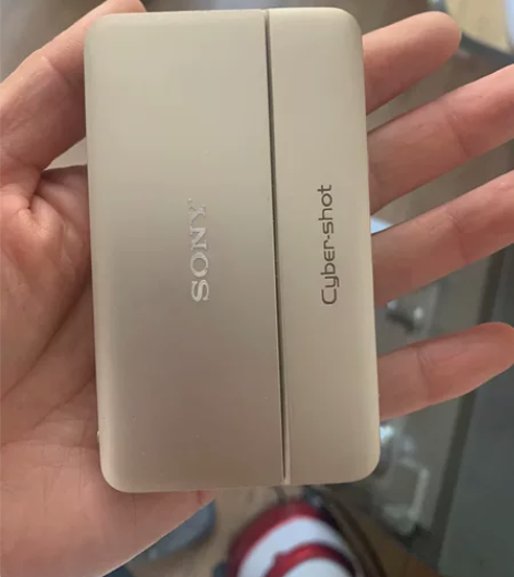 索尼tx55相机，自己用的，刚翻出来，橙色...
